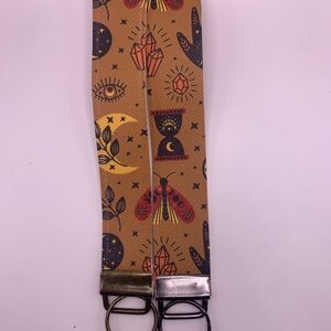 Mystical Patterned Wristlet with Gold and Silver Buckles